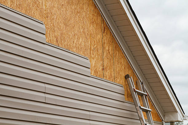 Professional Siding Installation technician working in McKees Rocks, PA